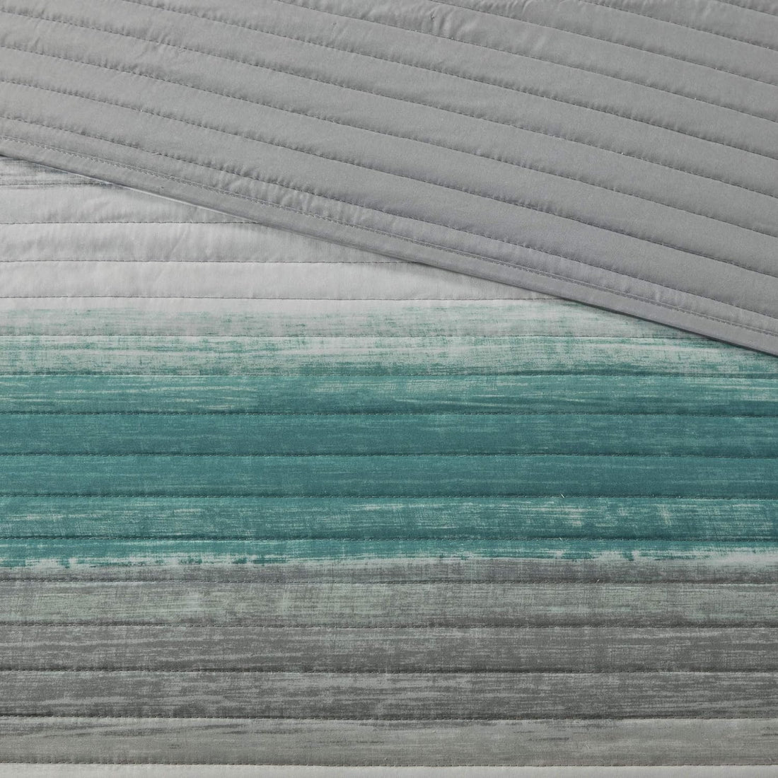 Juego de cama acolchado reversible a rayas en una bolsa de 8 piezas con juego de sábanas y almohada decorativa