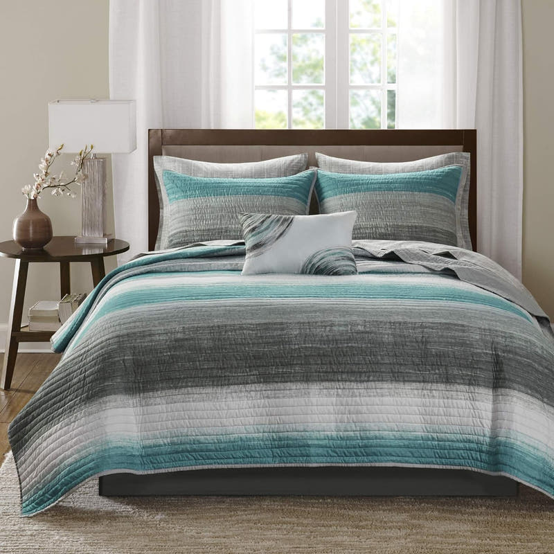 Juego de cama acolchado reversible a rayas en una bolsa de 8 piezas con juego de sábanas y almohada decorativa