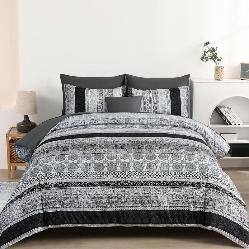 A bed in a bag set with striped microfiber comforter in a boho floral design, displayed in a bedroom setting.