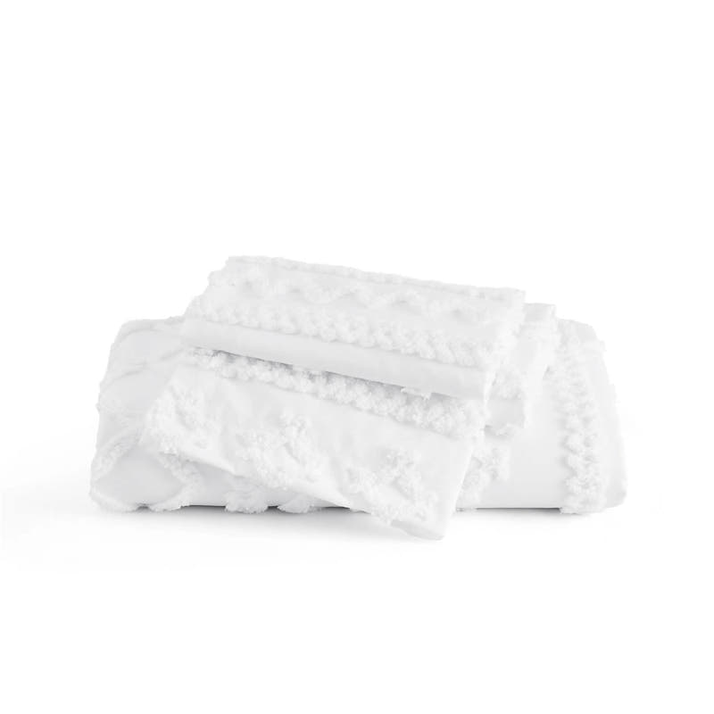 Folded white blanket on a white background